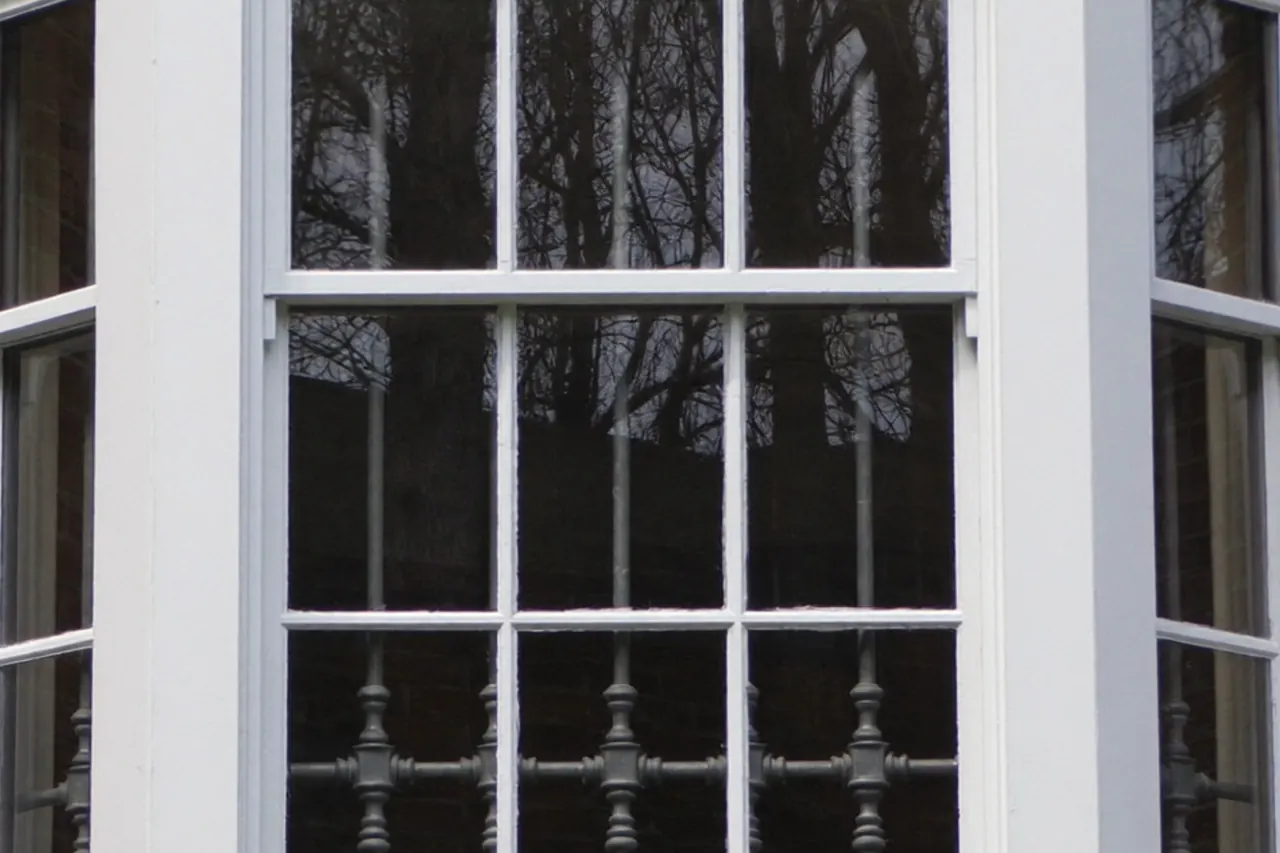 Close-up of an energy-efficient double-glazed unit showing the spacer bar and seal