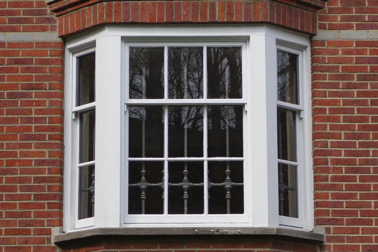 Victorian bay window fitted with modern sash-style replacement windows